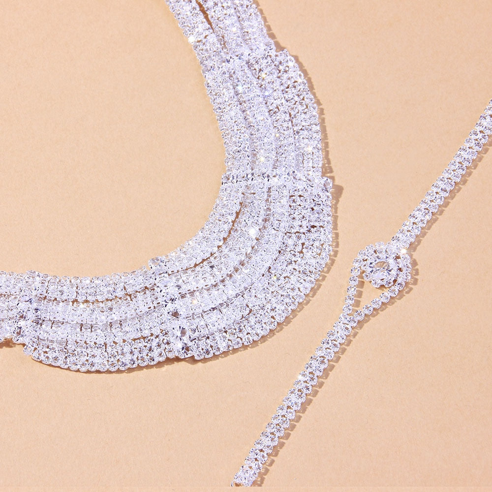 Indulge in the opulence of our Fashion Multilayer Rhinestone Collar Necklace Set, a luxurious adornment of unparalleled elegance.