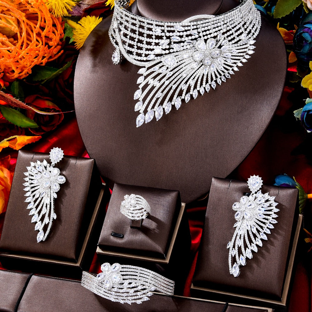Indulge in the opulence of our exquisite 4PCS Trendy Noble Feather Jewelry Set, a stunning ensemble of necklace, bangle, earrings, and ring.