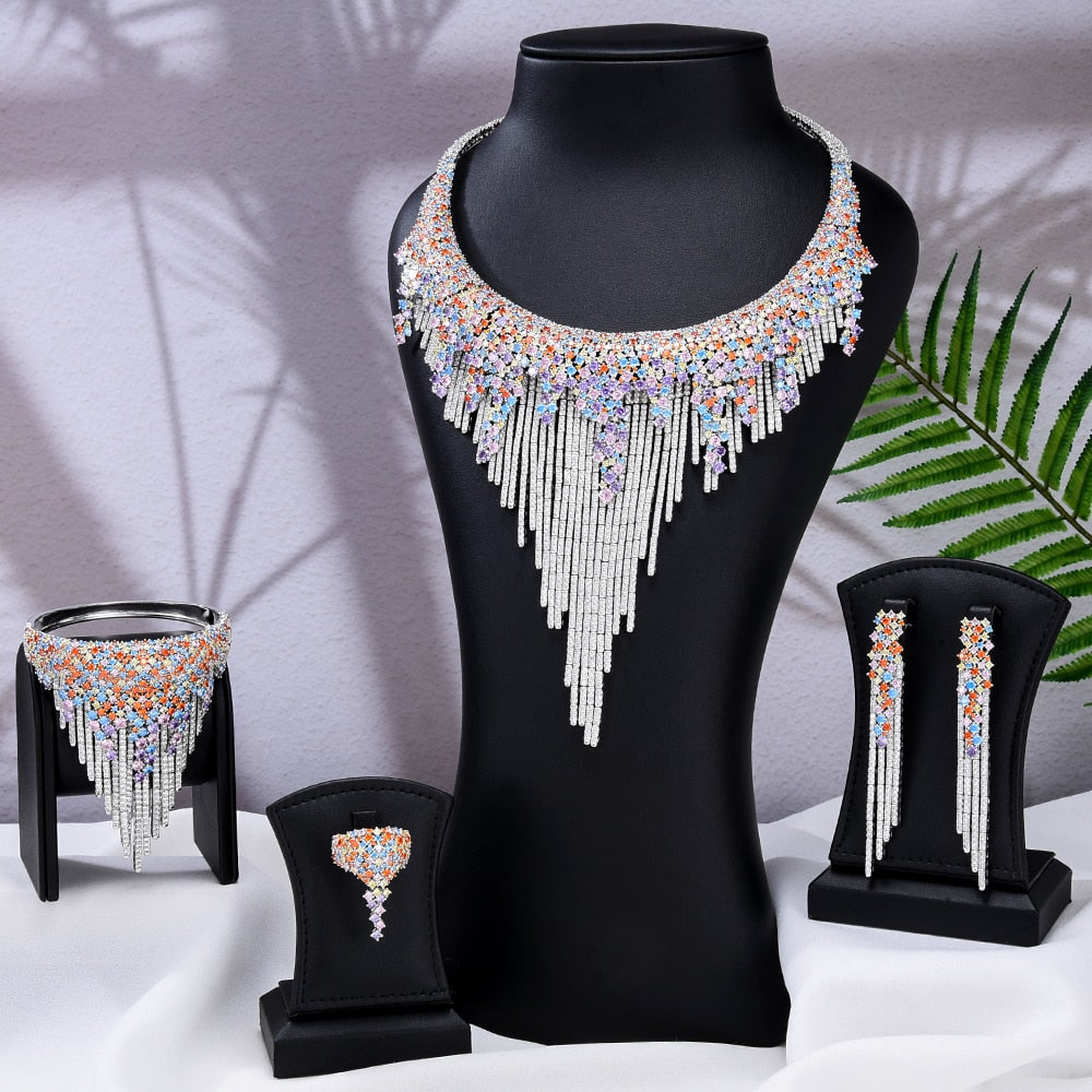 Experience the epitome of opulence with our Luxurious, Radiant Tassel Necklace, Bangle, Earrings, and Ring Jewelry Set.
