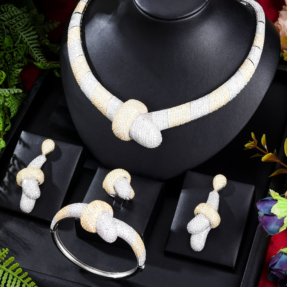 Indulge in opulence with our exquisite 4-piece Luxury Bow Necklace, Bangle, Earrings, and Ring Jewelry Sets.