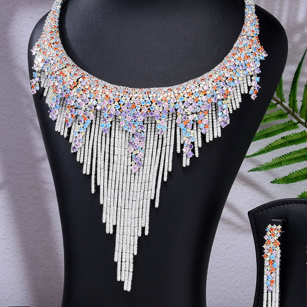 Experience the epitome of opulence with our Luxurious, Radiant Tassel Necklace, Bangle, Earrings, and Ring Jewelry Set.