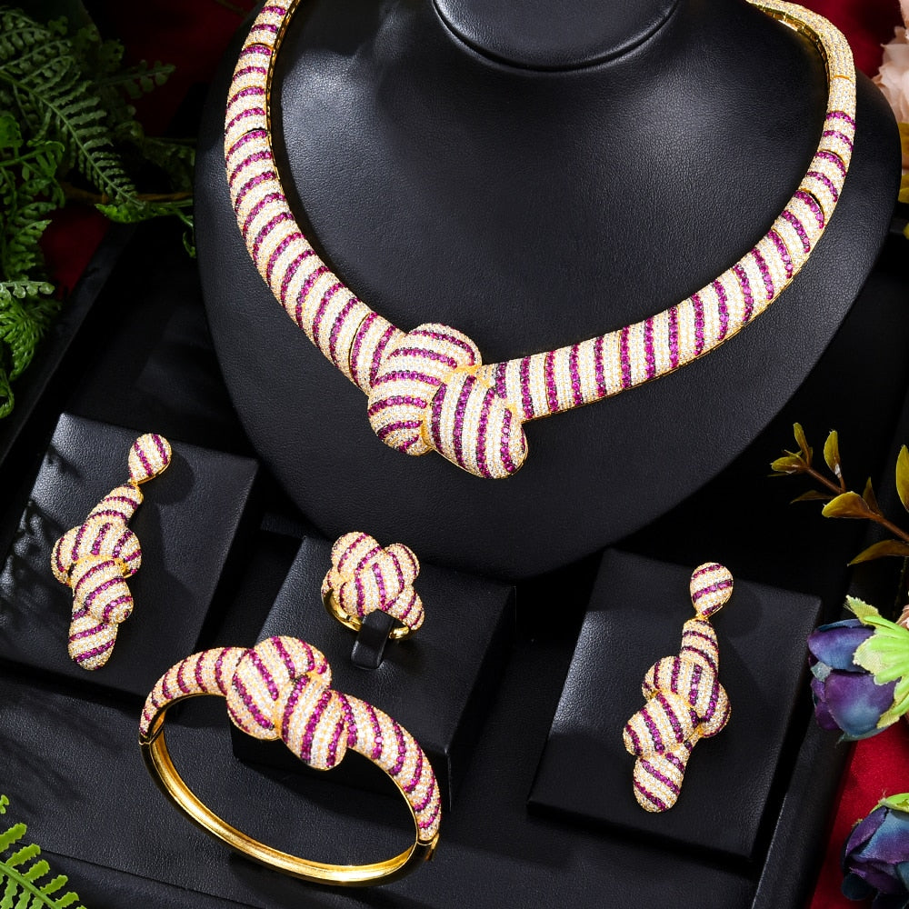 Indulge in opulence with our exquisite 4-piece Luxury Bow Necklace, Bangle, Earrings, and Ring Jewelry Sets.